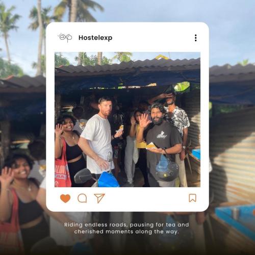 a picture of a group of people posing for a picture at HostelExp, Varkala - A Beach Town Hostel in Varkala