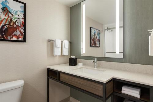 a bathroom with a sink and a mirror at Hilton Garden Inn Atlanta Downtown in Atlanta