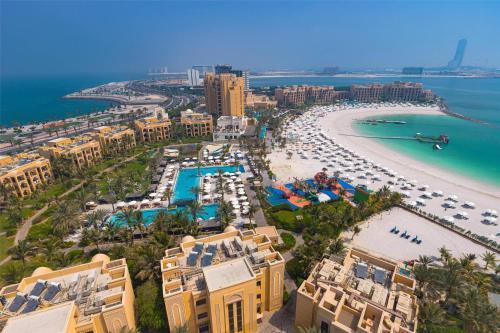 an aerial view of a resort and a beach at DoubleTree by Hilton Resort & Spa Marjan Island in Ras al Khaimah