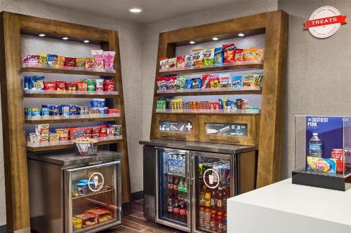 a store with two refrigerators in a store at Hampton Inn Colby in Colby