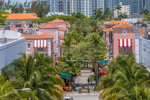 an aerial view of a city with palm trees and buildings at SBV Luxury Ocean Hotel Suites in Miami Beach