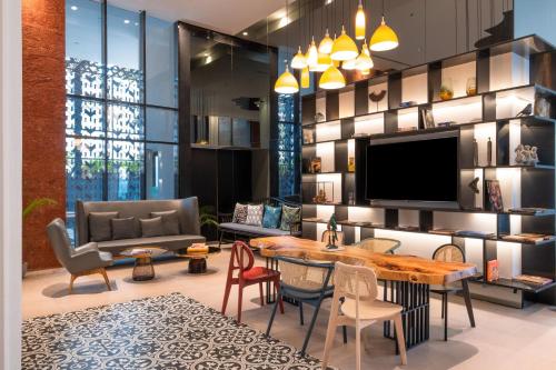 Χώρος καθιστικού στο Hyatt Centric Candolim Goa