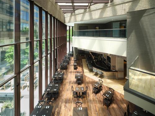 an overhead view of a building with tables and chairs at DoubleTree by Hilton Hotel Nashville Downtown in Nashville