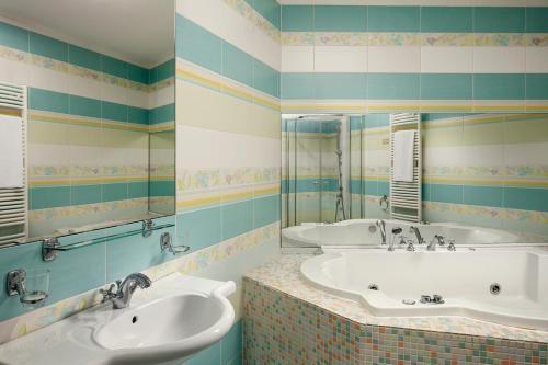 Koupelna v ubytování Hotel Ankora