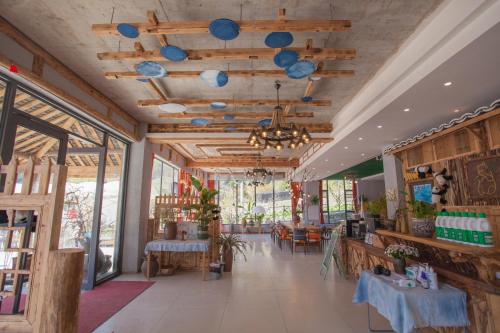 Restaurace v ubytování Wolong Muyue Qinglan Homestay