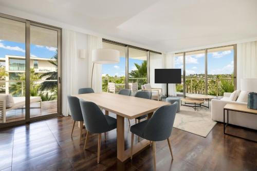 a dining room with a table and chairs at Marriott Residences Salgados Resort, Algarve in Albufeira
