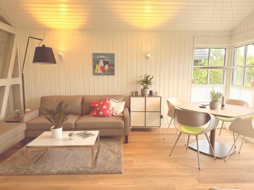 Posezení v ubytování Ferienhaus DIE SIEBEN in Kappeln an der Schlei