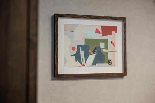 a picture of a painting on a wall at Sakuramachi Villa Projector BBQ Free parking 2 Bed Rooms in Kumamoto