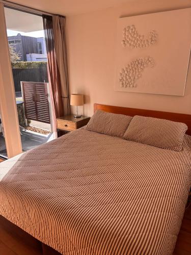 Postel nebo postele na pokoji v ubytování Sumner Bay Motel