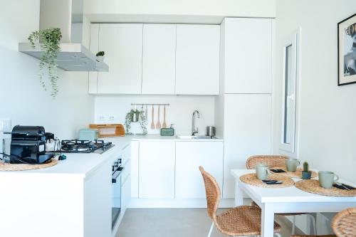 Кухня или мини-кухня в Casa Rita
