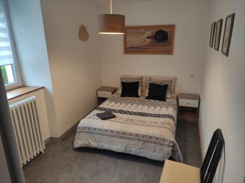 Postel nebo postele na pokoji v ubytování La Chatelardière