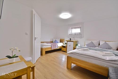Sunset Apartments - Villa La Mare - pokoje gościnne