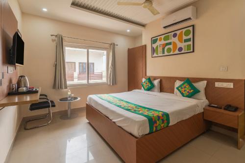 Televisyen dan/atau pusat hiburan di Treebo Raj Palace