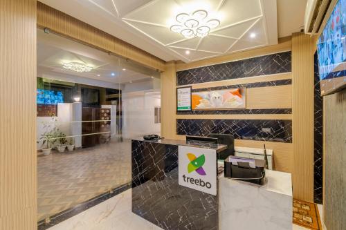 Ruang duduk di Treebo Raj Palace