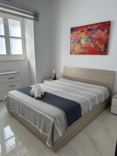 Postel nebo postele na pokoji v ubytování Central Bedroom Sliema