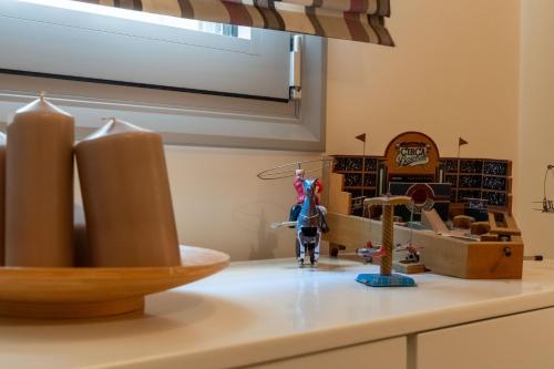 a kitchen counter with toys on a counter top at City Nook - Apt in Heraklion Centre in Bendevís