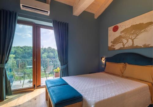 Ein Bett oder Betten in einem Zimmer der Unterkunft I Quattro Pozzi