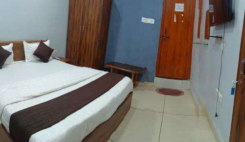 Postel nebo postele na pokoji v ubytování Hotel super corridor