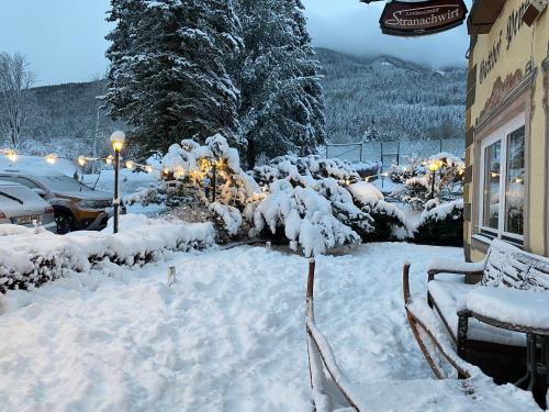 a yard covered in snow next to a building at Katschbergstub'n in Sankt Michael im Lungau