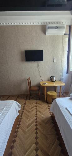 Postel nebo postele na pokoji v ubytování Hotel