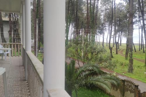 a view from the porch of a house at 4 Bed Villa-Sleeps 8-Parking-Garden-Sea View in Ureki