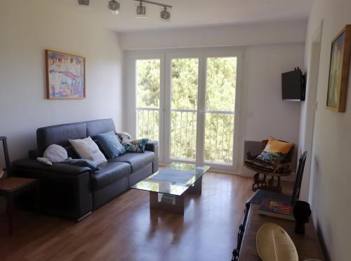 Posezení v ubytování Appartement 4 Pièces, 3 Chambres