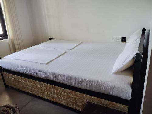 Cama o camas de una habitación en Knuckles Range Bungalow