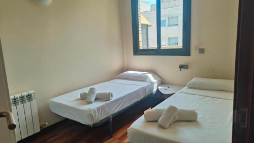 Posteľ alebo postele v izbe v ubytovaní Townhouse with communal pool ideal for families