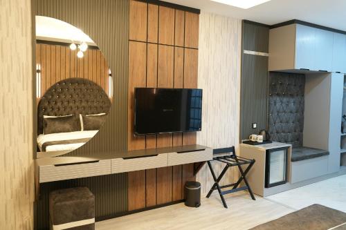 Μια τηλεόραση ή/και κέντρο ψυχαγωγίας στο Milena Otel
