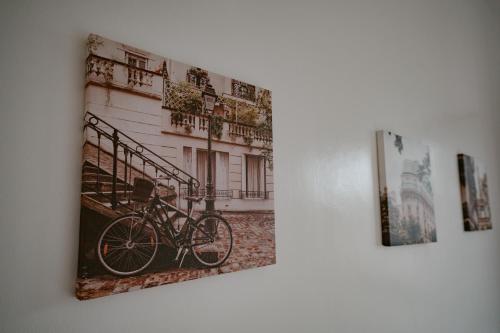 a picture of a bike hanging on a wall at Picturesque 3BR home near Thunderbird, Overlooking in Binangonan