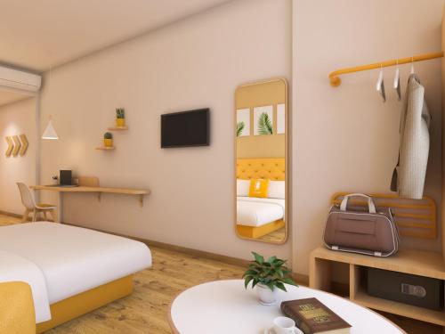 Bloom Hotel - Whitefieldにあるテレビまたはエンターテインメントセンター