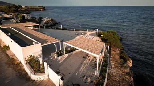 an aerial view of a house by the water at Villa Julia in Manfredonia
