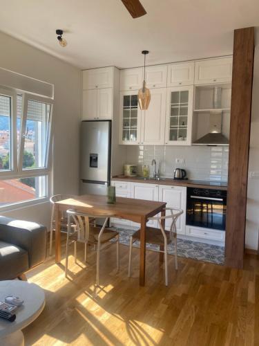 Η κουζίνα ή μικρή κουζίνα στο Comfort Stylish Apartment IVSOLE