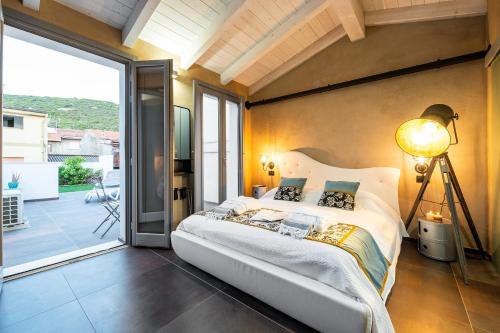 Postel nebo postele na pokoji v ubytování LUVIA ROOMS SPA