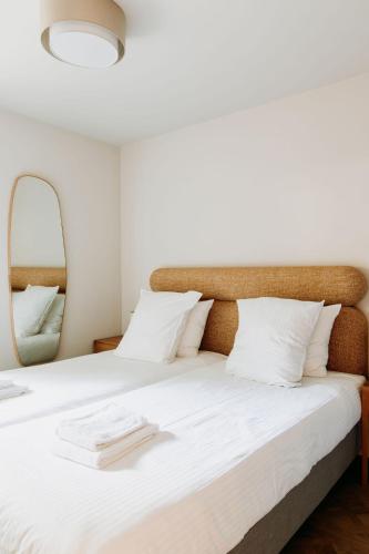Ένα ή περισσότερα κρεβάτια σε δωμάτιο στο Boutique Apartments Koogerend
