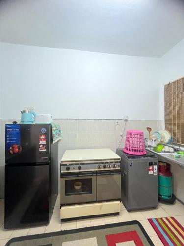 Η κουζίνα ή μικρή κουζίνα στο MGH Homestay Bangi Wonderland