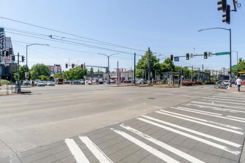 an intersection with an empty street with a crosswalk at Blueground Brighton balcony nr Seward Park SEA-874 in Seattle