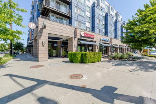 an empty street in front of a building at Blueground Brighton balcony nr Seward Park SEA-874 in Seattle