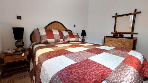 Postel nebo postele na pokoji v ubytování Taddart, C'est chez vous, tout simplement.