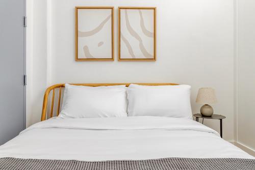 Voodi või voodid majutusasutuse Blueground Midtown West washerdryer nr Central Park NYC-1876 toas