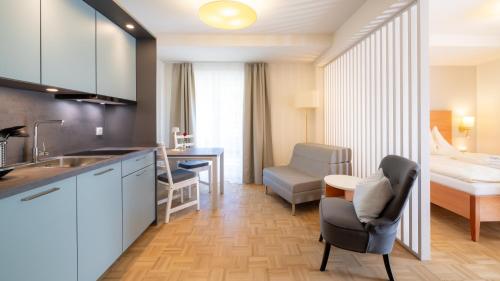 Kuchyň nebo kuchyňský kout v ubytování Aparthotel Klopeinersee