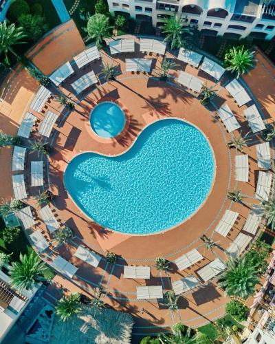 an overhead view of a swimming pool in a resort at JAZ Makadi Saraya Resort in Hurghada