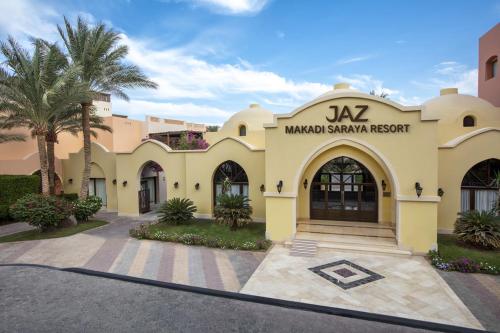 a building with the name of the mambo station resort at JAZ Makadi Saraya Resort in Hurghada