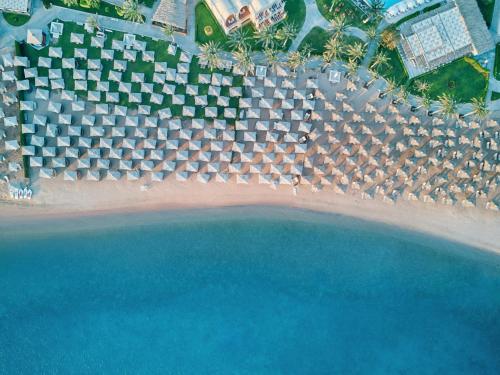an aerial view of a beach and the ocean at JAZ Makadi Saraya Resort in Hurghada