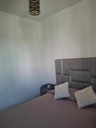 Postel nebo postele na pokoji v ubytování appartement chams