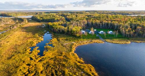 an aerial view of a house on an island in the water at Island Beach Hideaways in Pomquet
