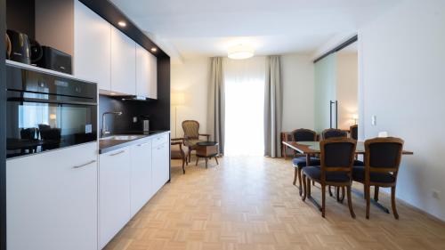 Kuchyň nebo kuchyňský kout v ubytování Aparthotel Klopeinersee