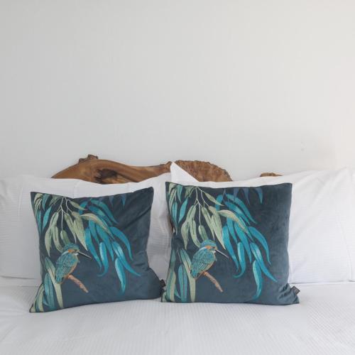 two pillows sitting on top of a bed at Rydal Lodge in Rydal