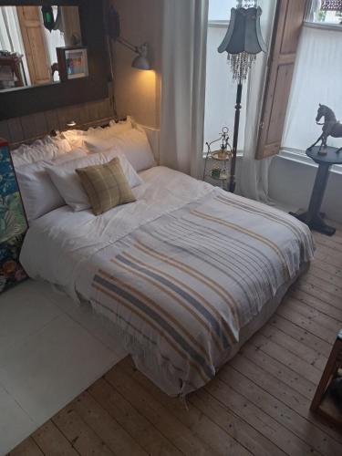 Ένα ή περισσότερα κρεβάτια σε δωμάτιο στο HILD Apartment London Sleeps 2 near Alexandra Palace