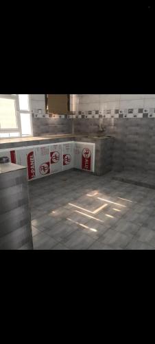 a room with signs on the walls of a building at فيلا في صحم in Murtafa‘āt Şaḩam